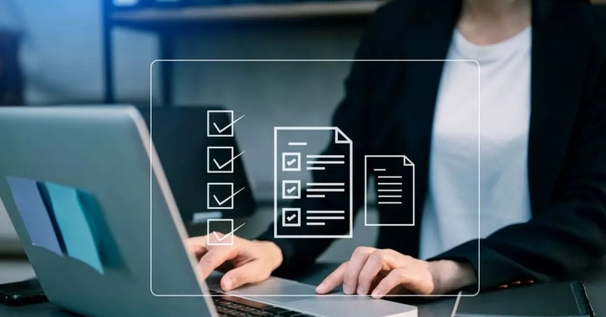 A person in business attire uses a laptop, with digital icons of checklists and documents overlaid in the foreground—perfect for those looking to audit my website seamlessly and efficiently.