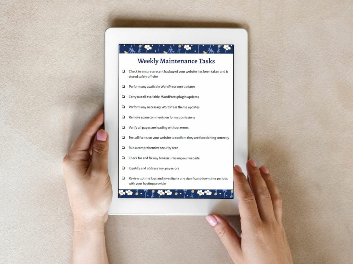A person holds a tablet displaying a checklist titled "Weekly Maintenance Tasks" with various website maintenance tasks listed on the screen.