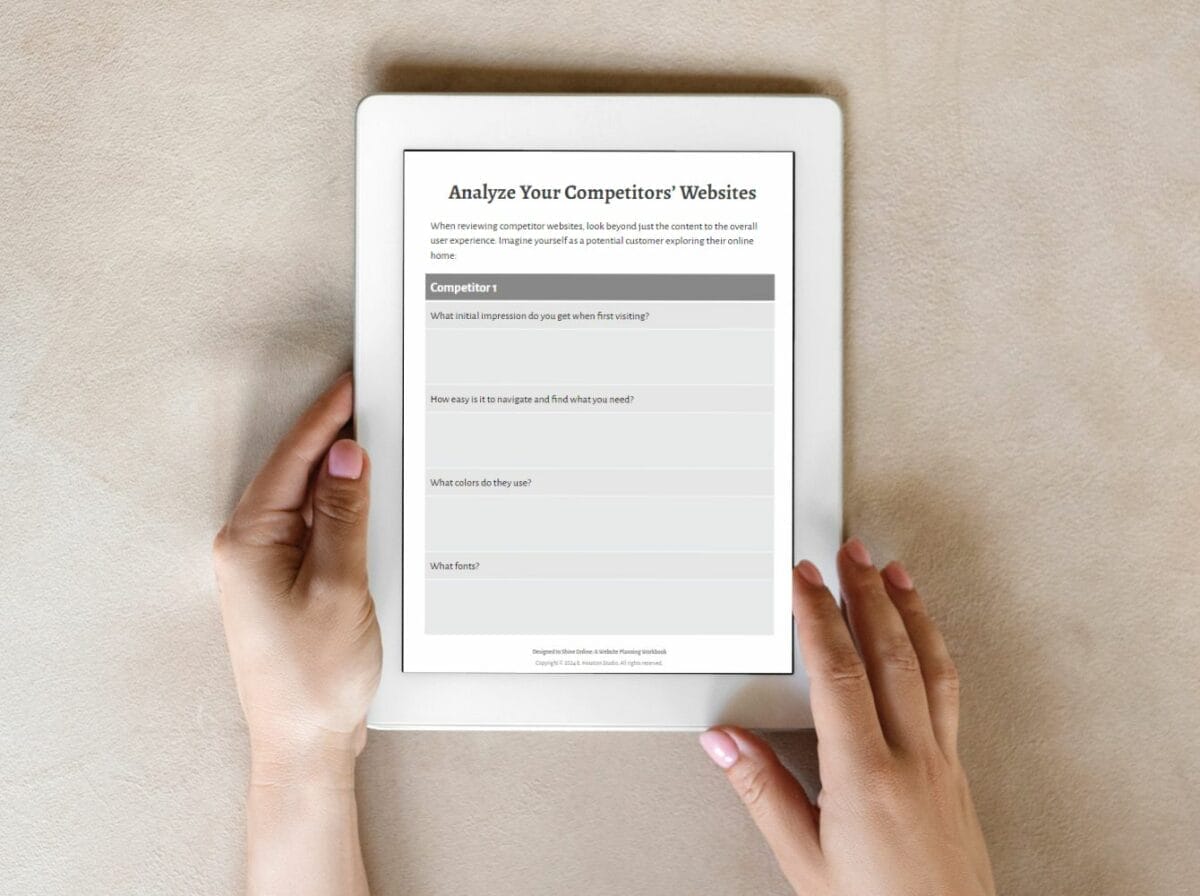 Person holding a tablet displaying a worksheet titled "Analyze Your Competitors' Websites" with a list of questions under the "Competitors" section.