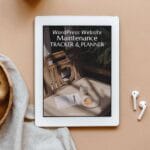 A white tablet displays a cover titled "WordPress Website Maintenance Tracker & Planner," next to a wooden tray with clips and a pair of white wireless earphones.