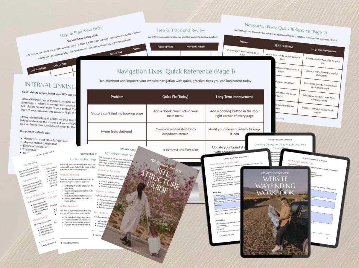 A collection of printed worksheets, reference guides, a workbook, and a paperback book on a table, all related to website navigation and structure.