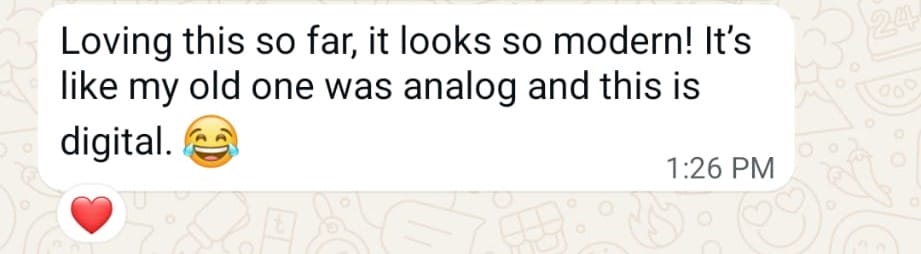 A WhatsApp message reads: "Loving this so far, it looks so modern! It's like my old one was analog and this is digital." with a laughing emoji and heart reaction.